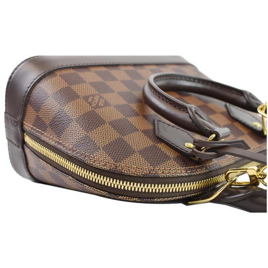 Louis Vuitton, Alma BB Damier plain, brown-checked rubbe…