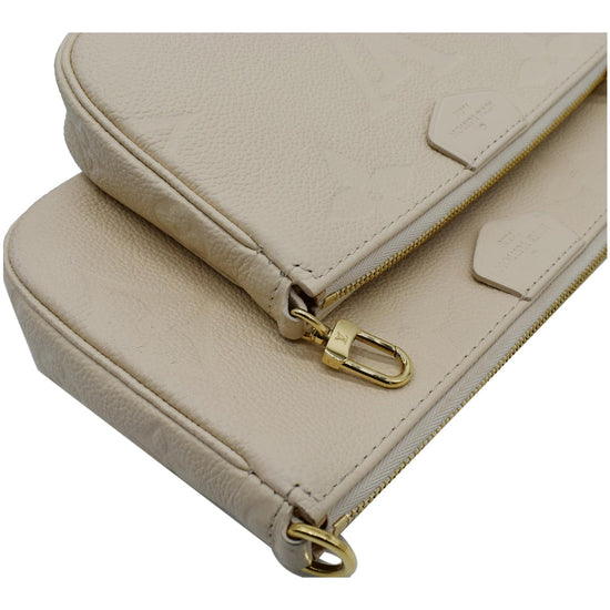 Louis Vuitton Cream Monogram Empreinte Multi-Pochette Accessoires For Sale  at 1stDibs  louis vuitton multi pochette cream, louis vuitton cream  empreinte, lv multi pochette accessoires empreinte