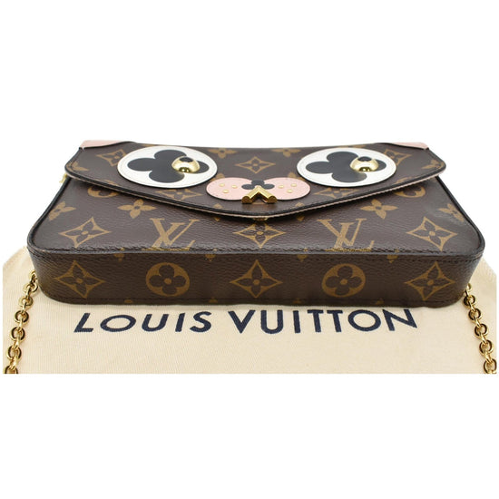  Original Louis Vuitton accessories, bag pendant in the  shape of a small dog with Monogram Reverse Ca