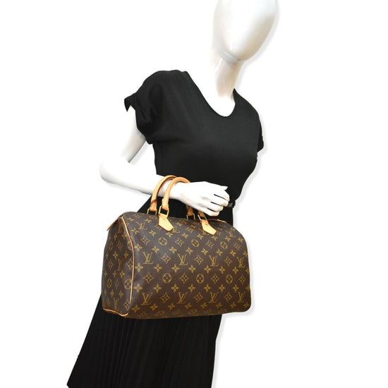 Speedy handbag Louis Vuitton Brown in Cotton - 32693791