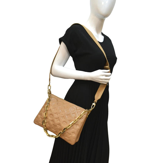 Shop Exclusive: Louis Vuitton Coussin PM Camel Lambskin | Buy Pre-owned Luxury Handbags at REDELUXE