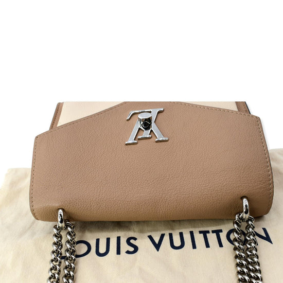 Louis Vuitton Portefeuil Lock Me Long Purse M62530 – Timeless Vintage  Company