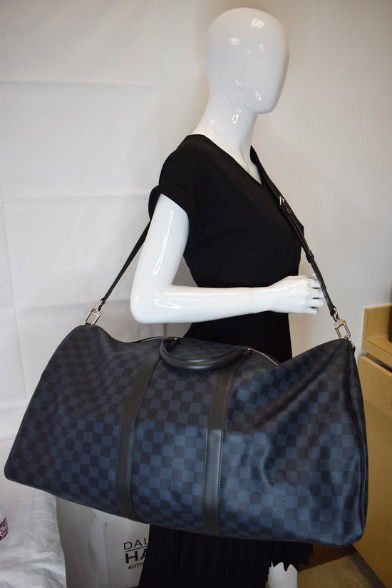 LOUIS VUITTON Damier Graphite Keepall Bandouliere 55 ❤ liked on