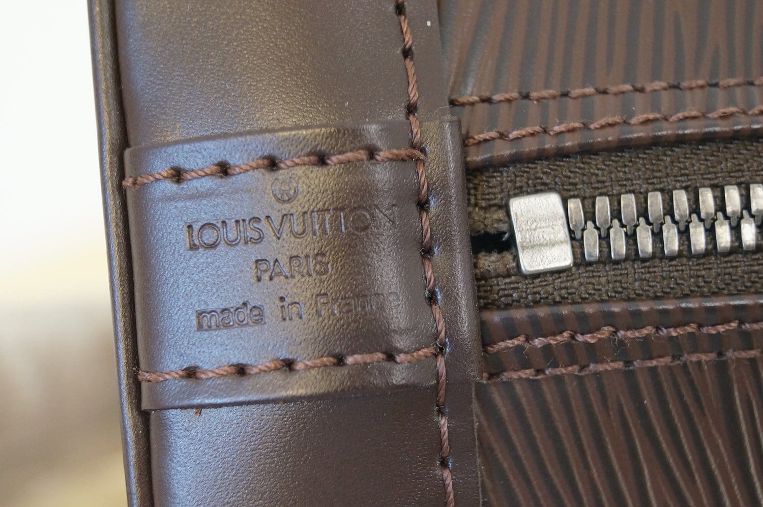 LOUIS VUITTON Epi Leather Alma Mocha Handbag