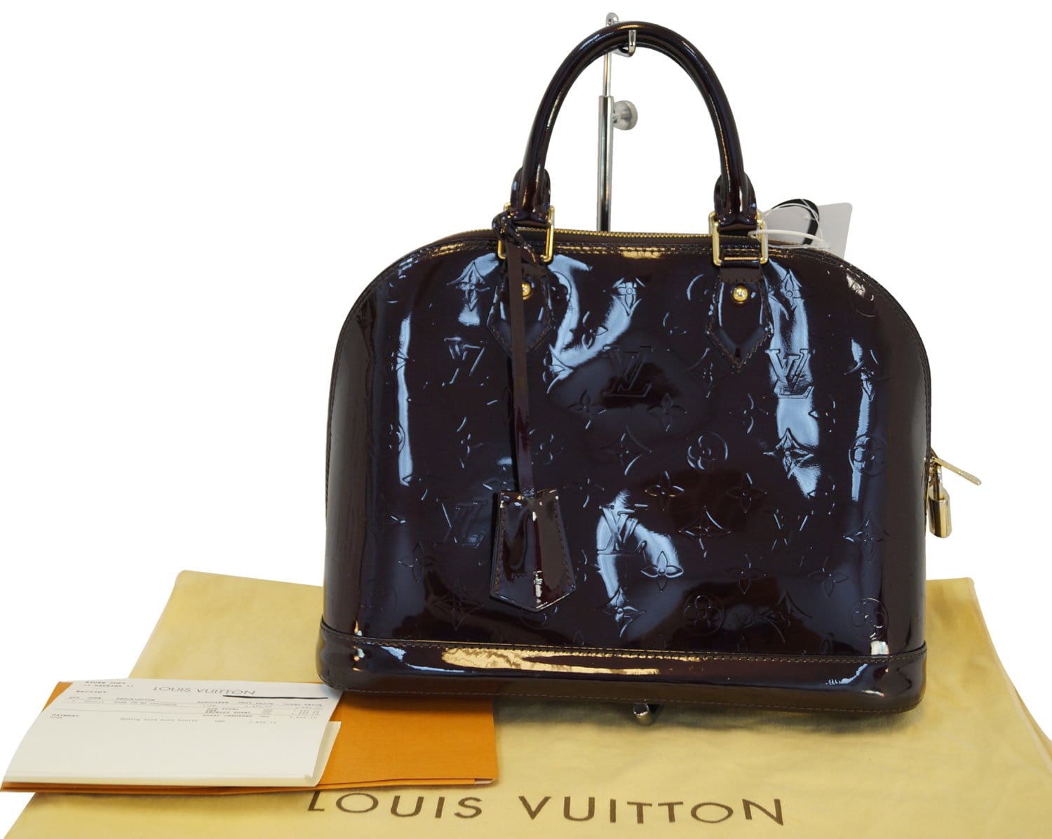 Louis Vuitton 2000s Black Vernis Alma Monogram Handbag · INTO