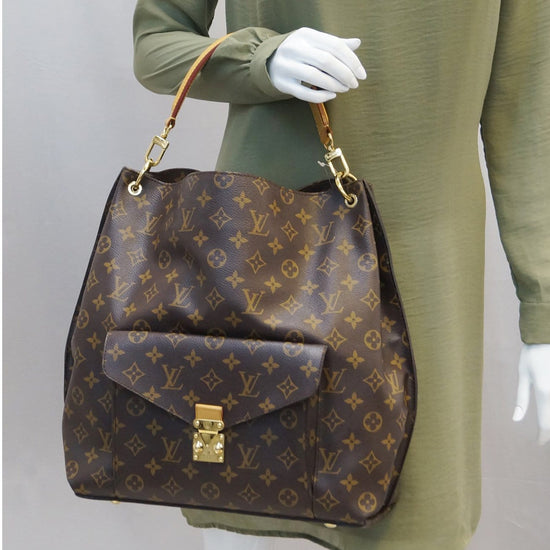 👜✨ Check out this stunning Louis Vuitton Metis Hobo in the