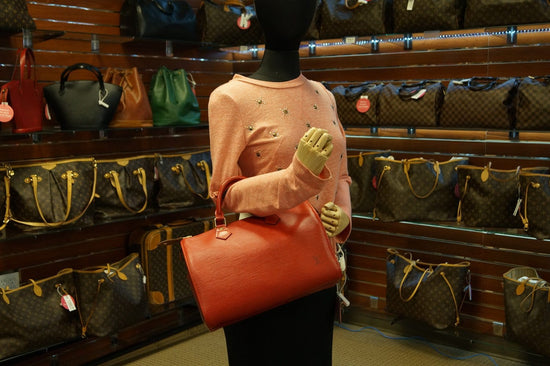 Louis Vuitton Ségur handbag in red epi leather