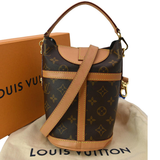 Duffle crossbody bag Louis Vuitton Brown in Cotton - 24142836
