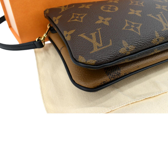 LOUIS VUITTON Reverse Monogram Giant Double Zip Pochette 1253704