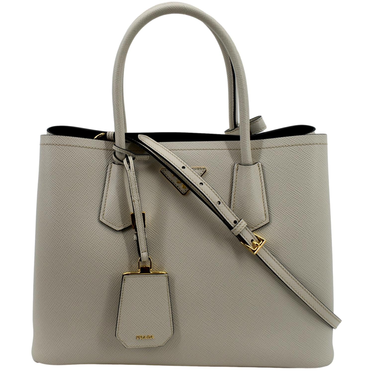 PRADA: crossbody bag in saffiano leather - White