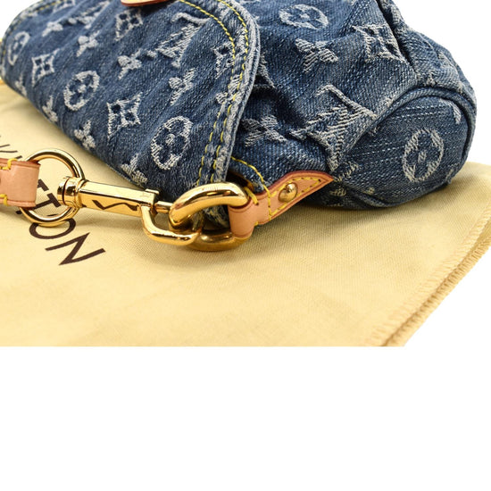 LOT:1427  LOUIS VUITTON - a Mini Pleaty blue denim shoulder bag.