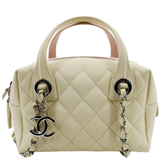 Chanel feather weight bi colour bowling bag, Luxury, Bags