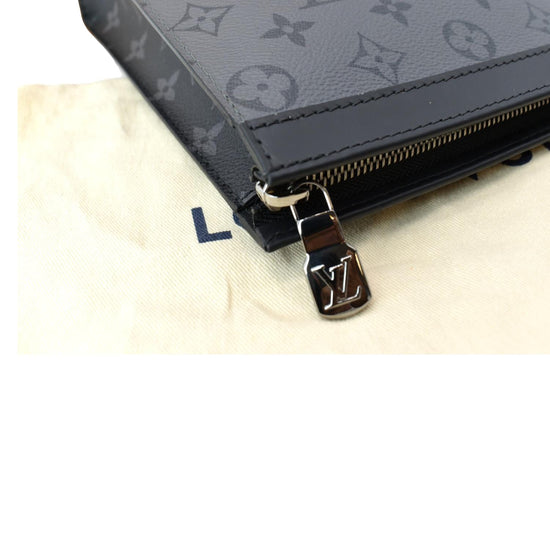 Louis Vuitton® Pochette Voyage Souple Eclipse. Size in 2023