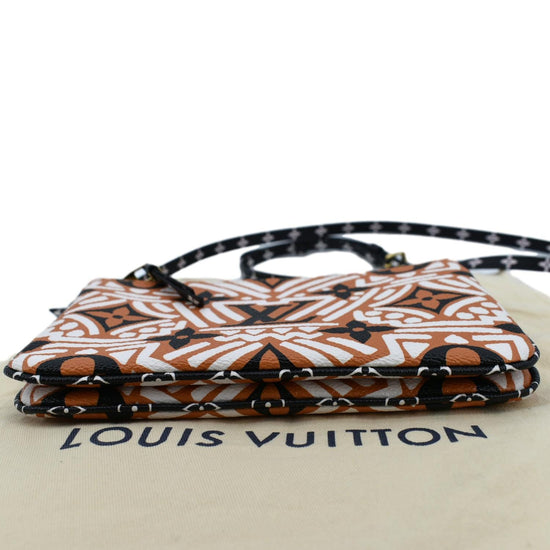 Authentic Louis Vuitton Crafty double zip Pochette