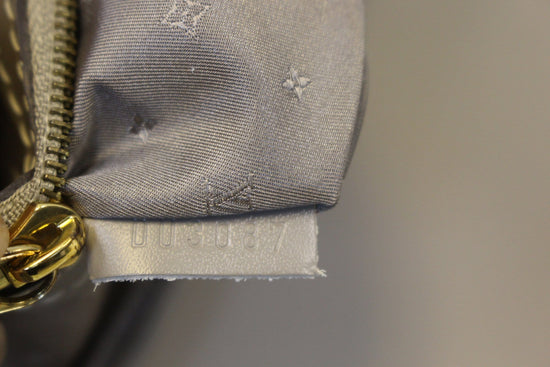 Louis Vuitton, A Suhali leather 'Le Favori Verone Wallet'. - Bukowskis