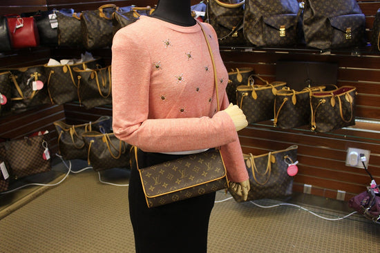 At Auction: Louis Vuitton, Louis Vuitton Monogram Canvas Pochette Twin GM