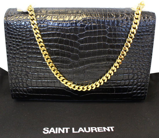 Crocodile clutch bag Yves Saint Laurent Black in Crocodile - 29511854