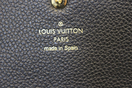 Louis Vuitton Curieuse Wallet Aurore Empreinte Leather– Pom's ReLuxed