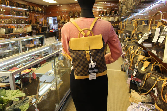 LOUIS VUITTON DAMIER EBENE SOHO CENTENAIRE BACKPACK – Caroline's Fashion  Luxuries