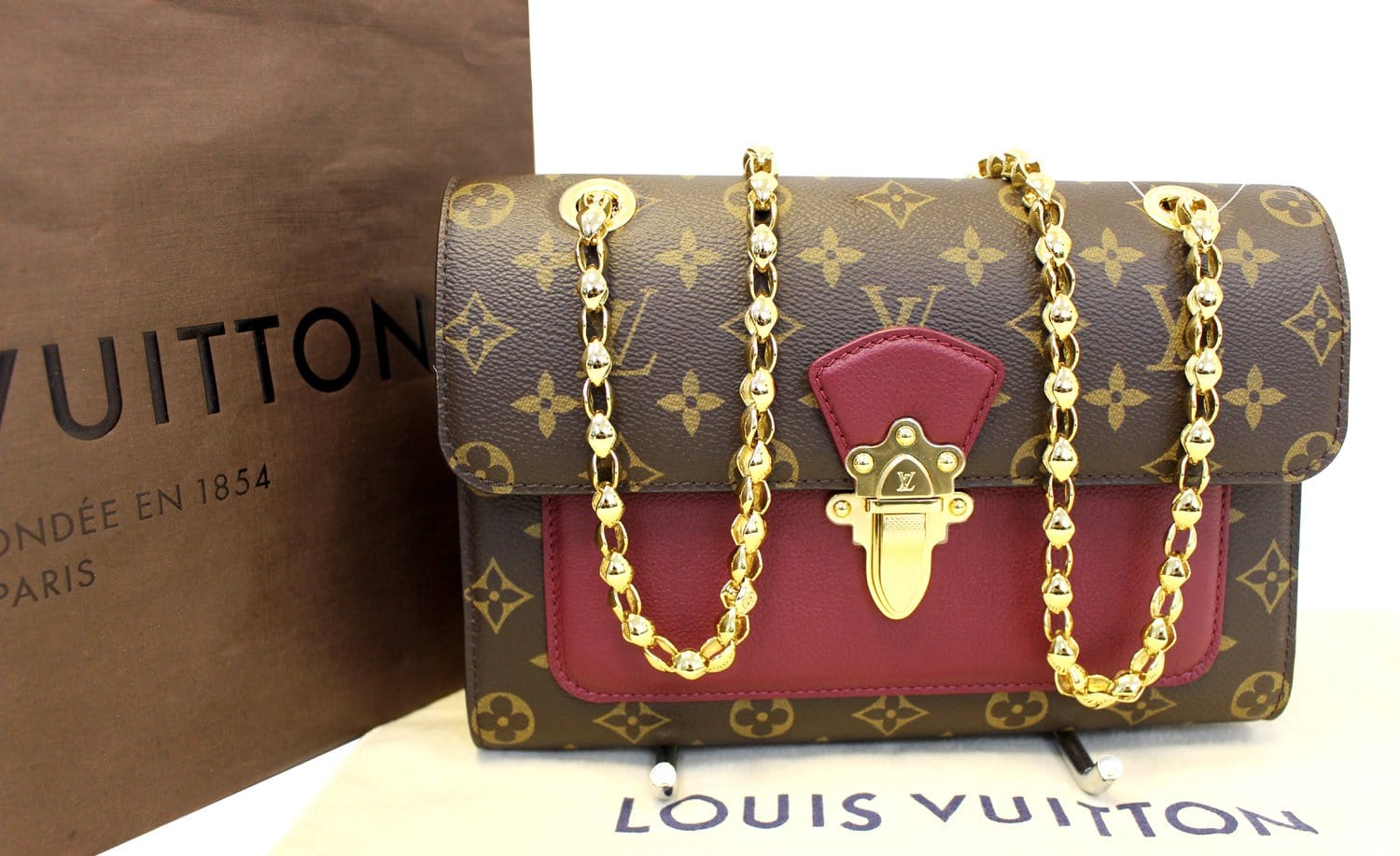 Louis Vuitton Raisin Monogram Canvas Victoire Bag For Sale at 1stDibs