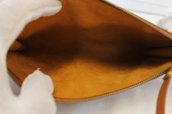 Pochette accessoire leather handbag Louis Vuitton Brown in Leather -  19553639