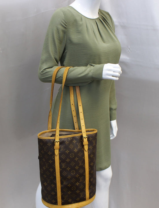 Bucket leather handbag Louis Vuitton Brown in Leather - 30562012