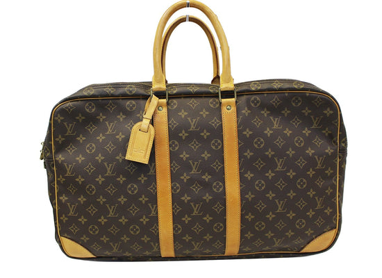 How to pack a Vintage Louis Vuitton Keepall 55 for a 15 day trip. 