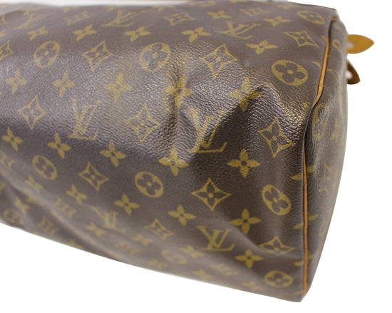 Louis Vuitton Pre Owned Monogram Canvas Speedy 35 Bag, $786, Bluefly