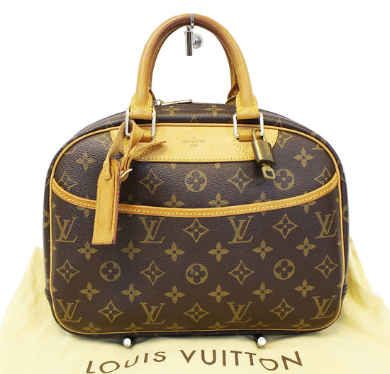 Louis Vuitton Monogram Canvas Trouville. Made in France. DC: MI0014. With  certificate of authenticity from ENTRUPY.