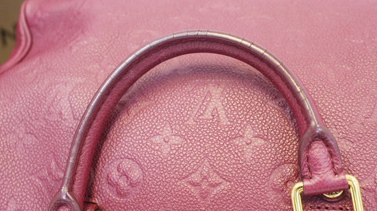 Louis Vuitton Speedy 25 Handbag in Raspberry Pink Empreinte Monogram