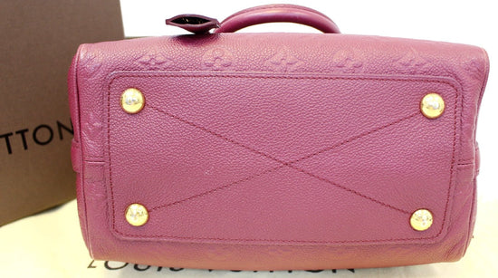 LOUIS VUITTON 25 cm bag in smooth leather and pink spik…