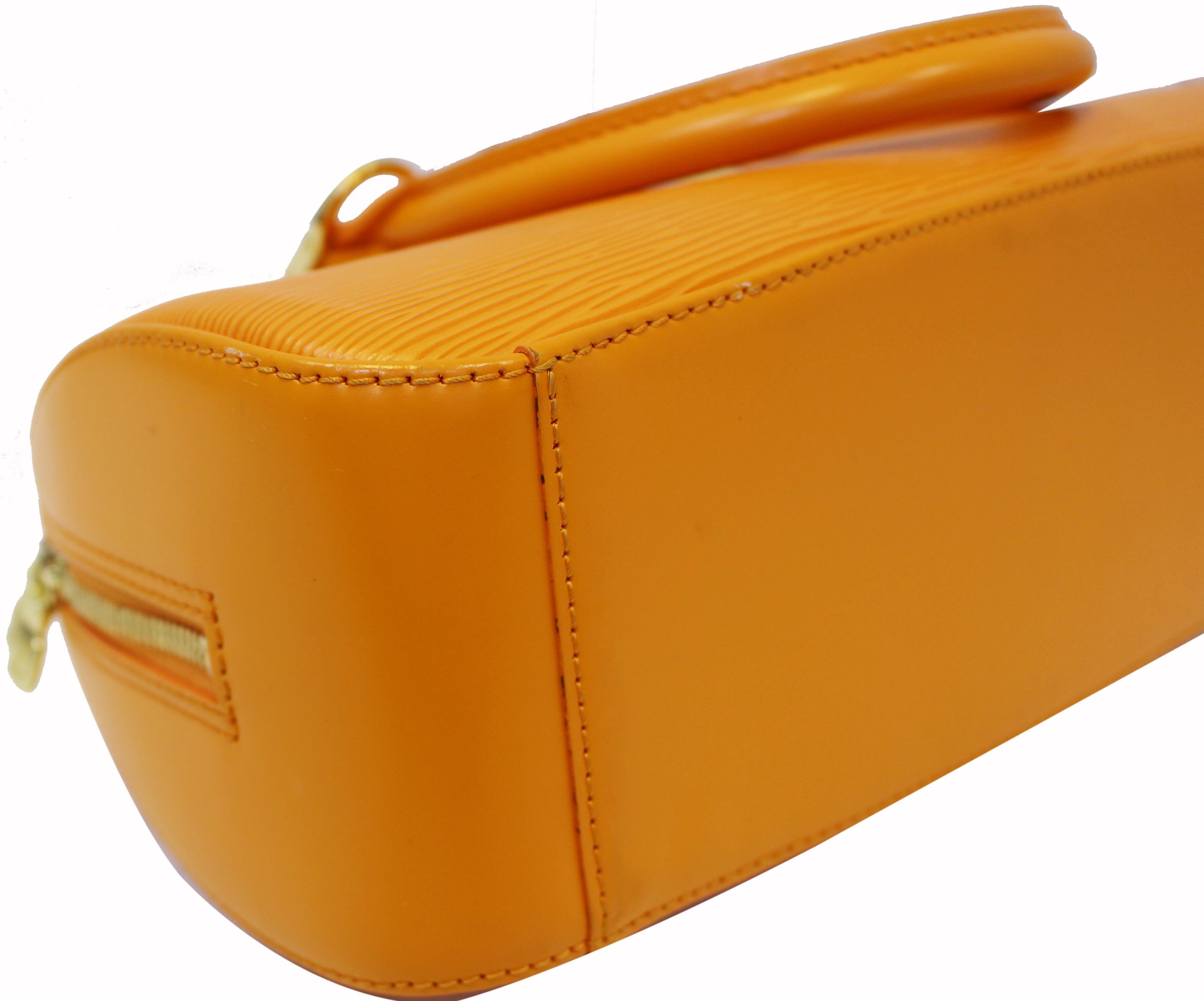 Lot - A yellow epi leather shoulder bag and belt, Louis Vuitton