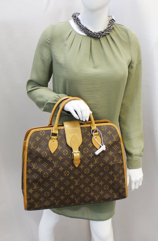 Lot - Louis Vuitton Rivoli monogram business handbag purse: coated canvas  with rolled leather handles 12 1/2H x 15 1/2W x 4 3/4D, 4H (strap drop)