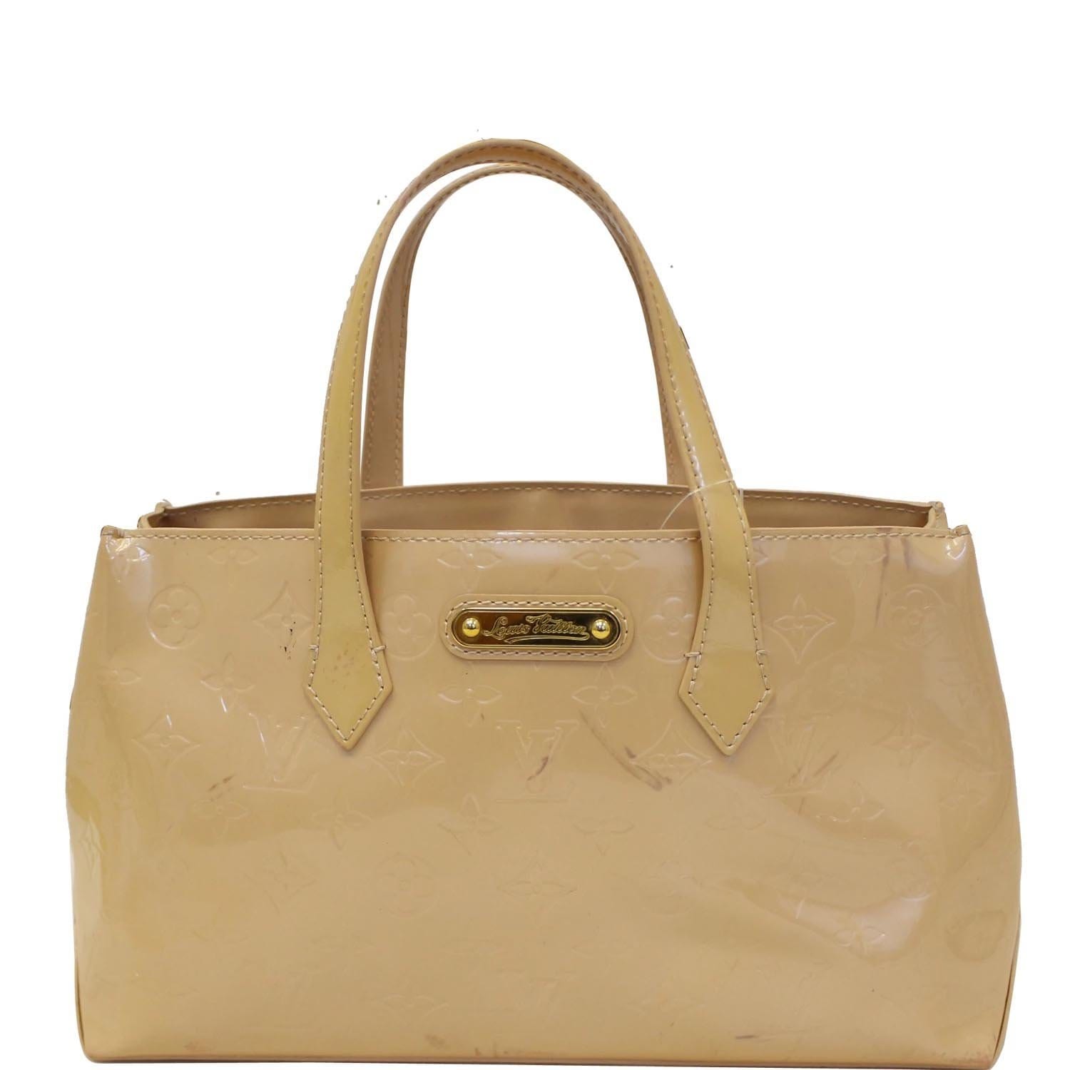 Wilshire PM Top handle bag in Monogram Vernis leather, Gold Hardware