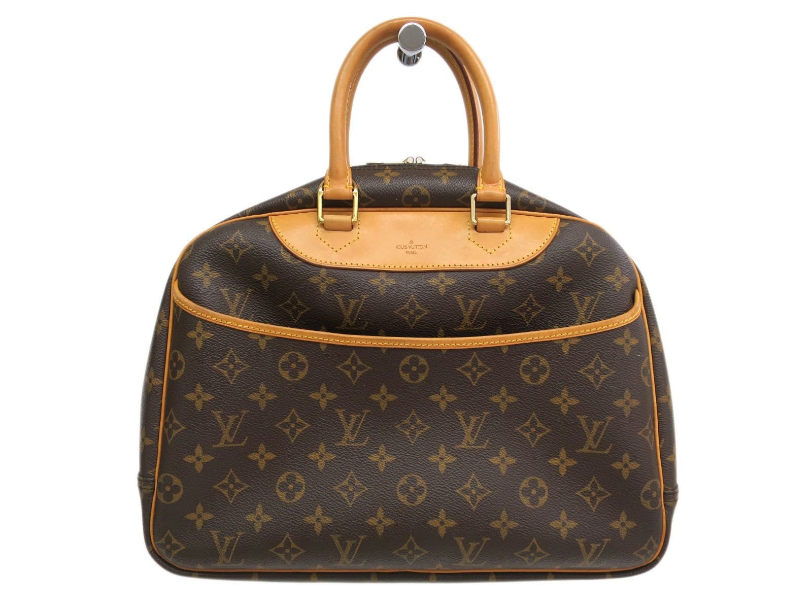 Louis Vuitton monogrammed bowling vanity canvas handbag with leather trim  and handles photographed on a white background Stock Photo - Alamy