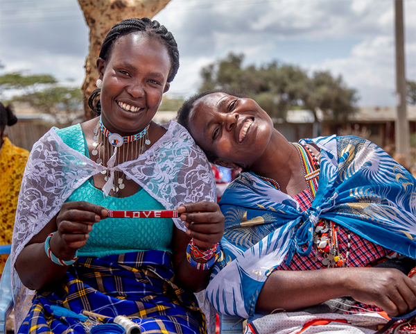 Maasai women beading Love is project bracelets