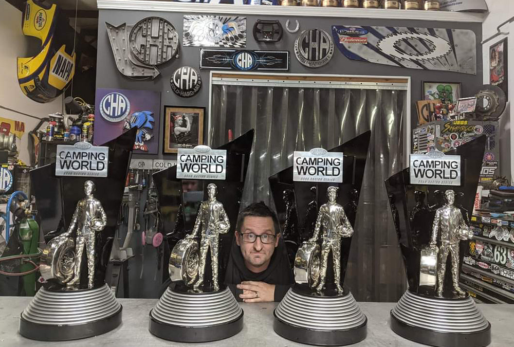 Tom and trophies he made