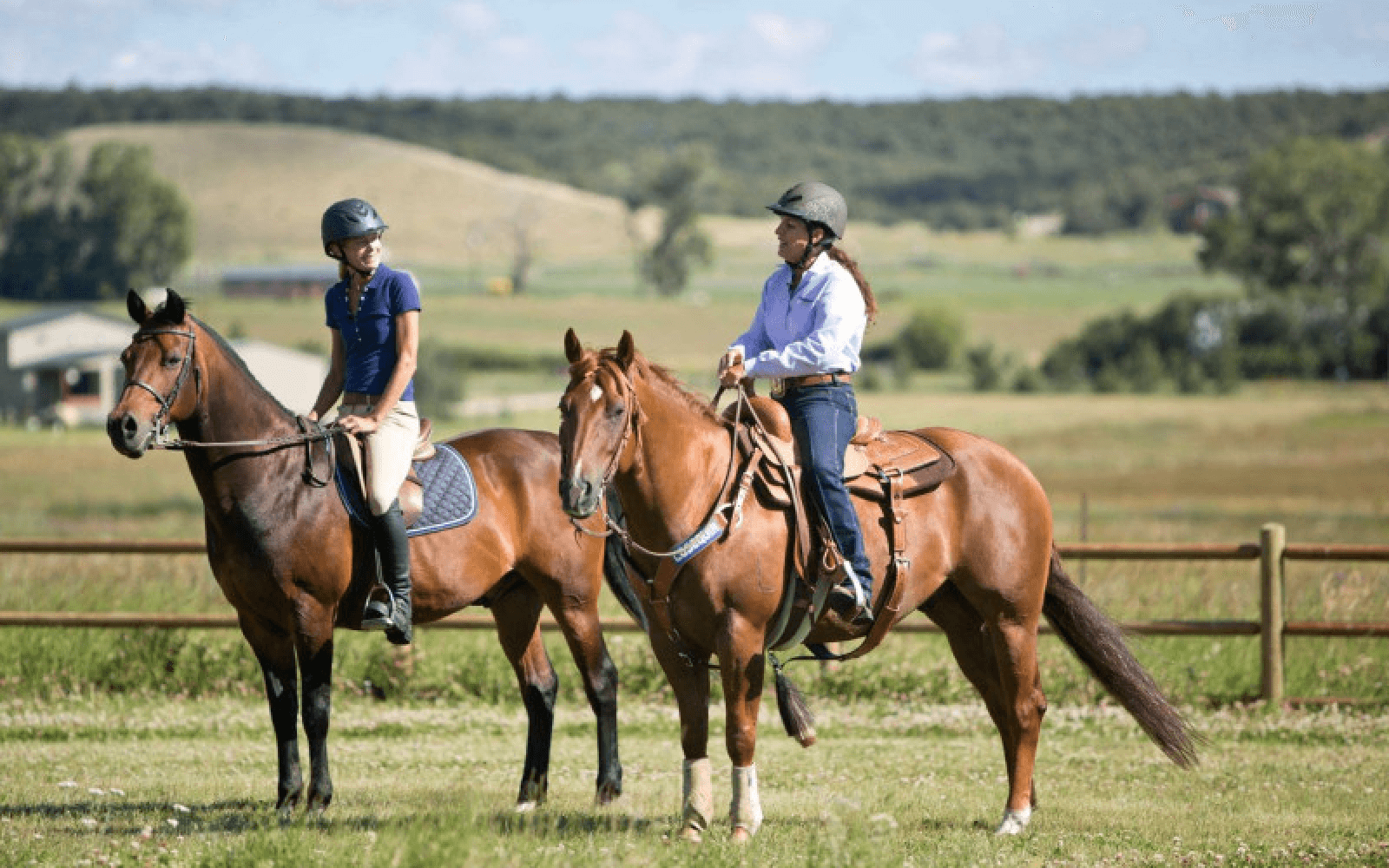 A couple horseback riding at the C U Lazy ranch 