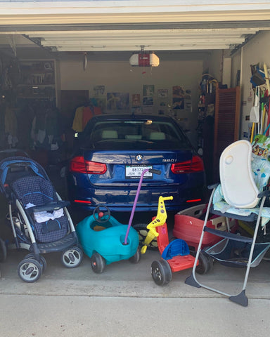 garage full of baby and kid gear