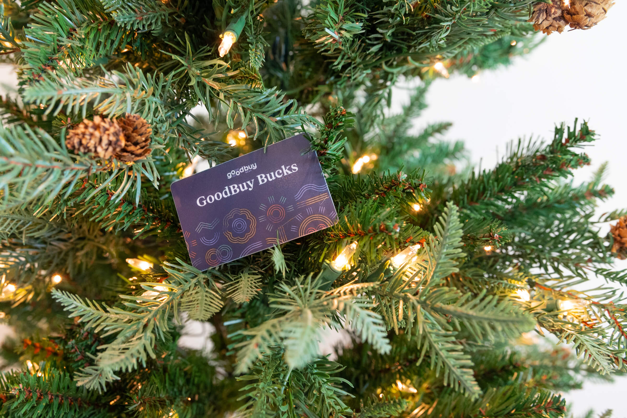 GoodBuy Gear Gift Card hanging from a Christmas tree