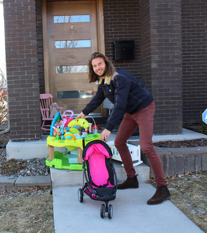 man selling baby items