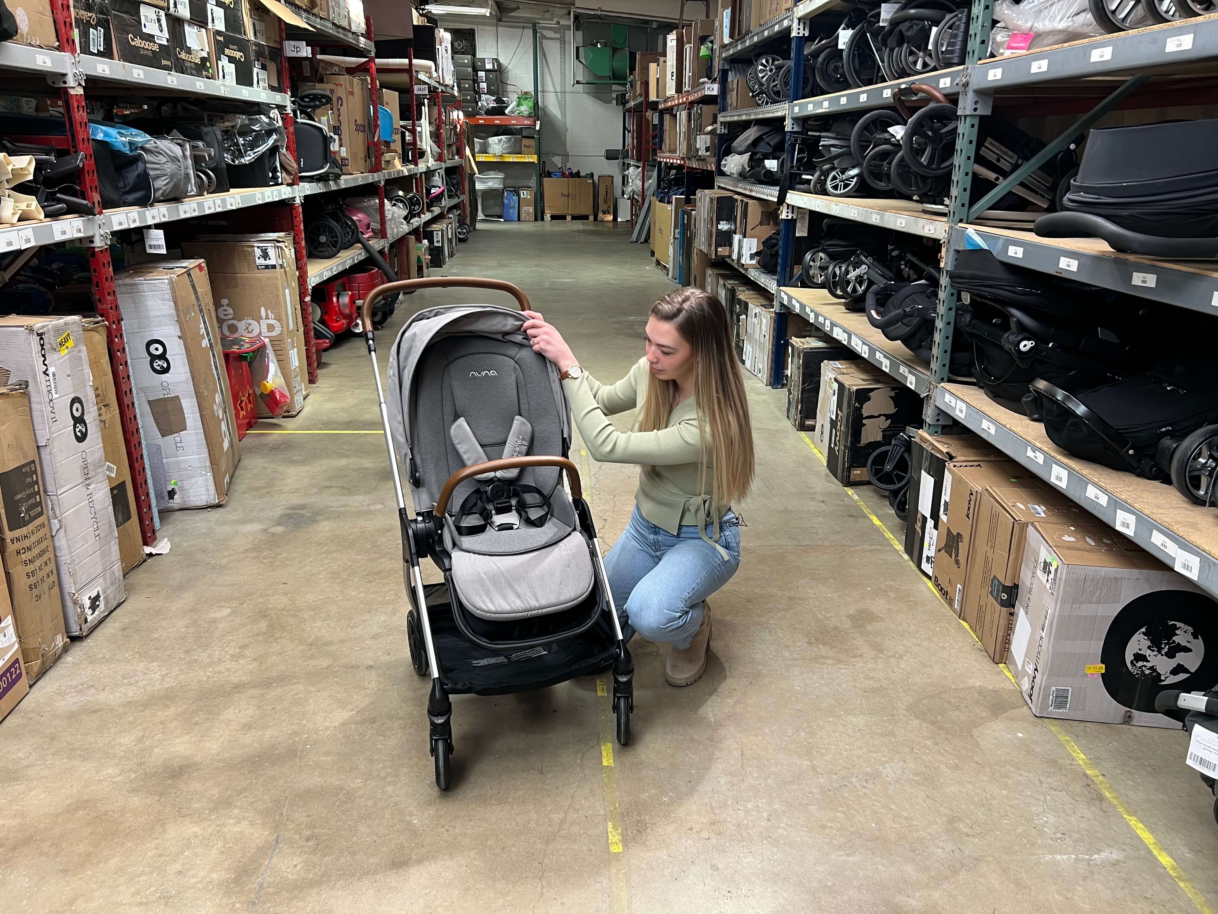 GoodBuy Gear's gear expert inspecting the Nuna TRIV