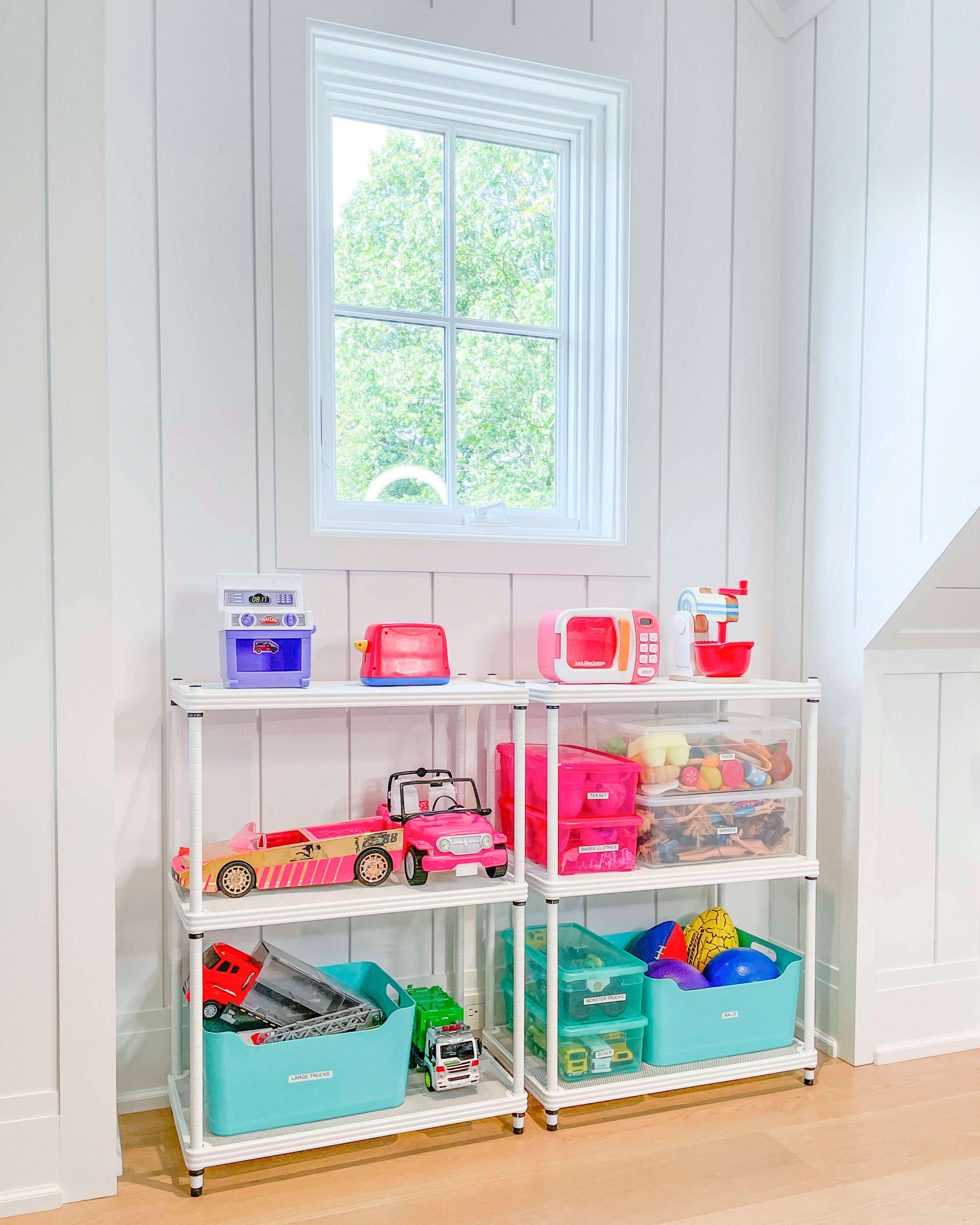 an organized shelf in a kids room 