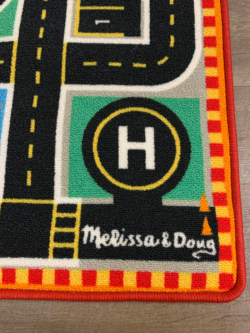 melissa and doug round the city rescue rug
