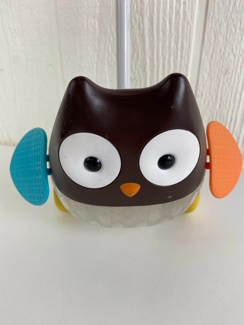 skip hop rolling owl push toy