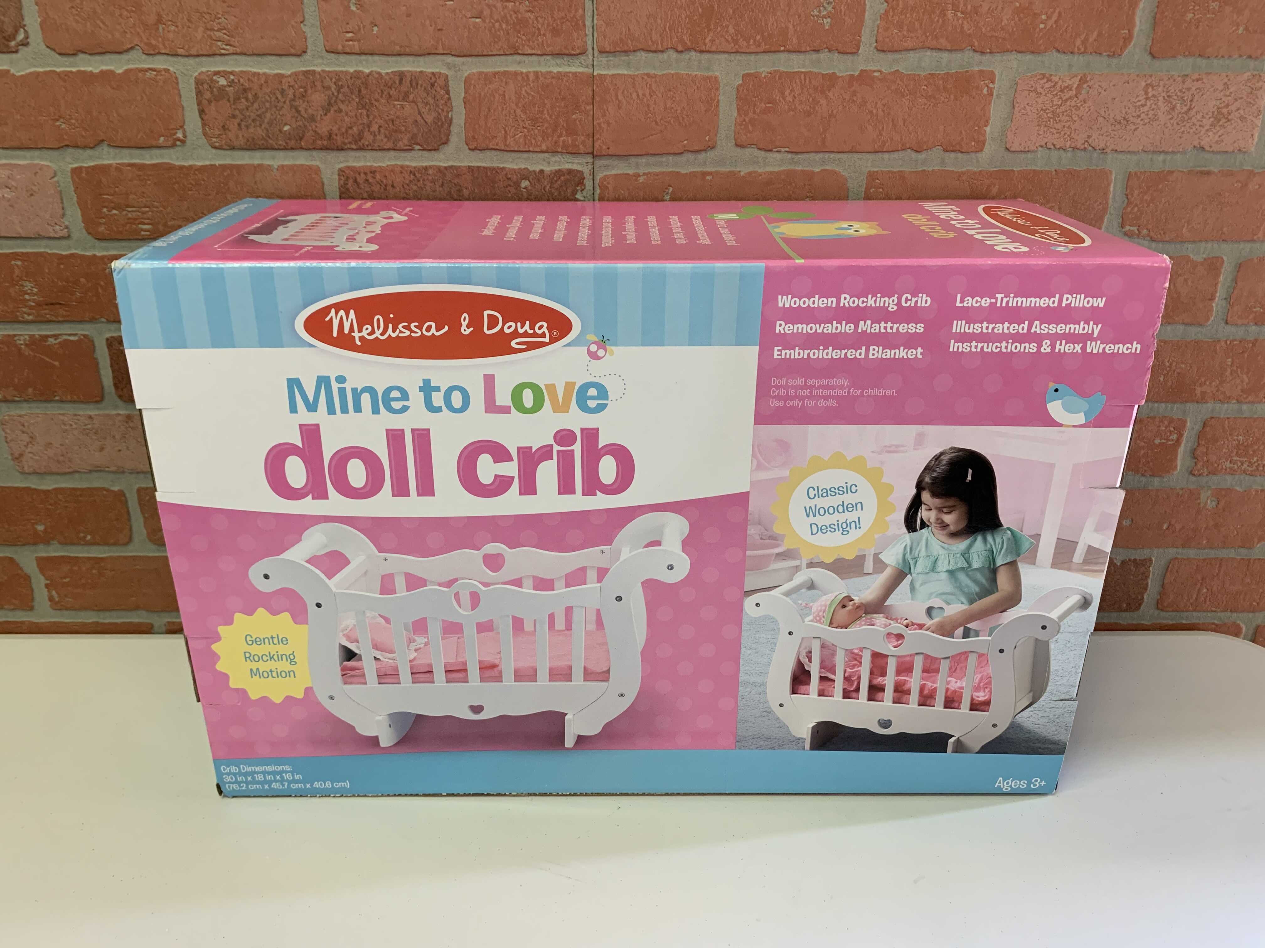 melissa and doug baby doll crib