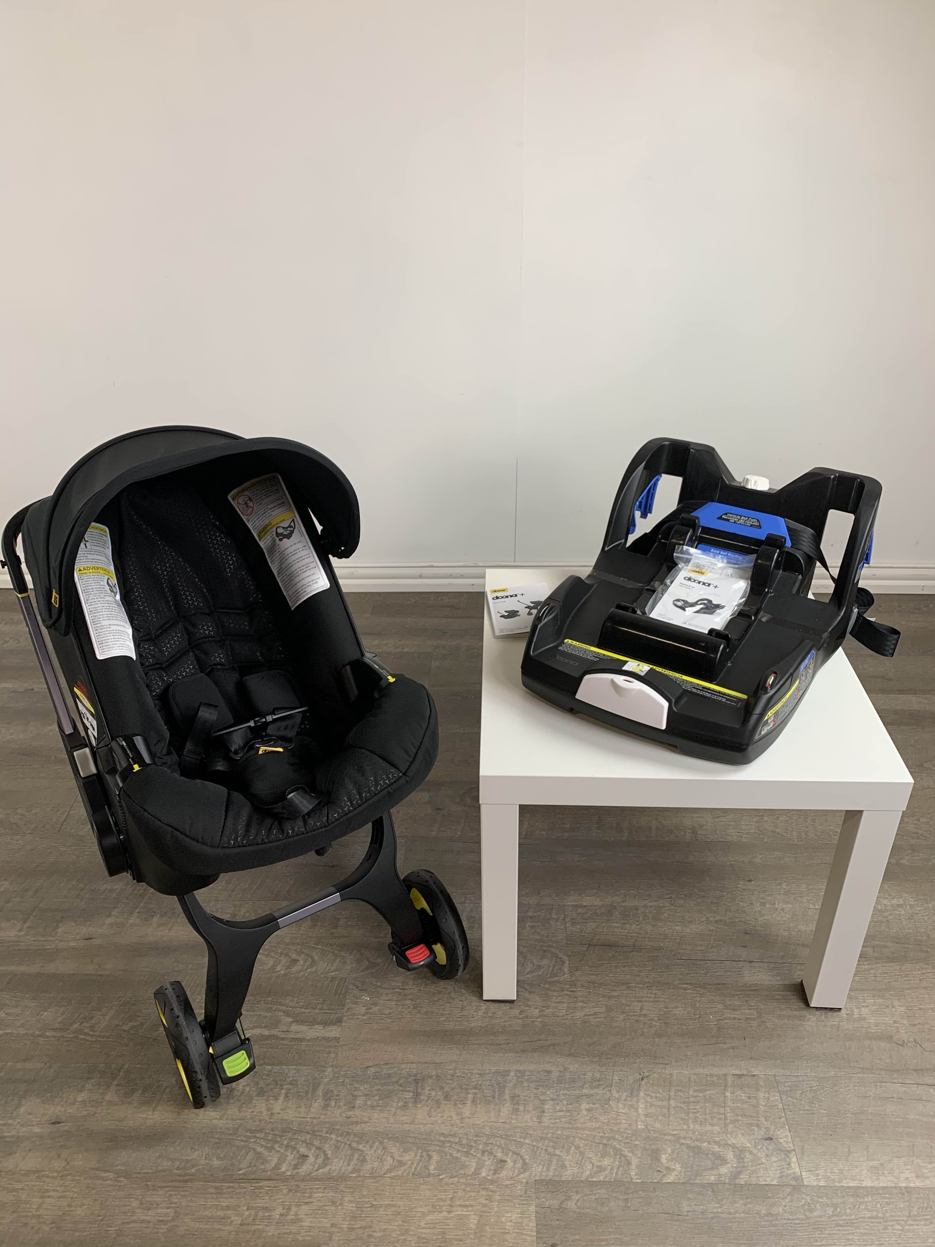 black car seat and stroller combo