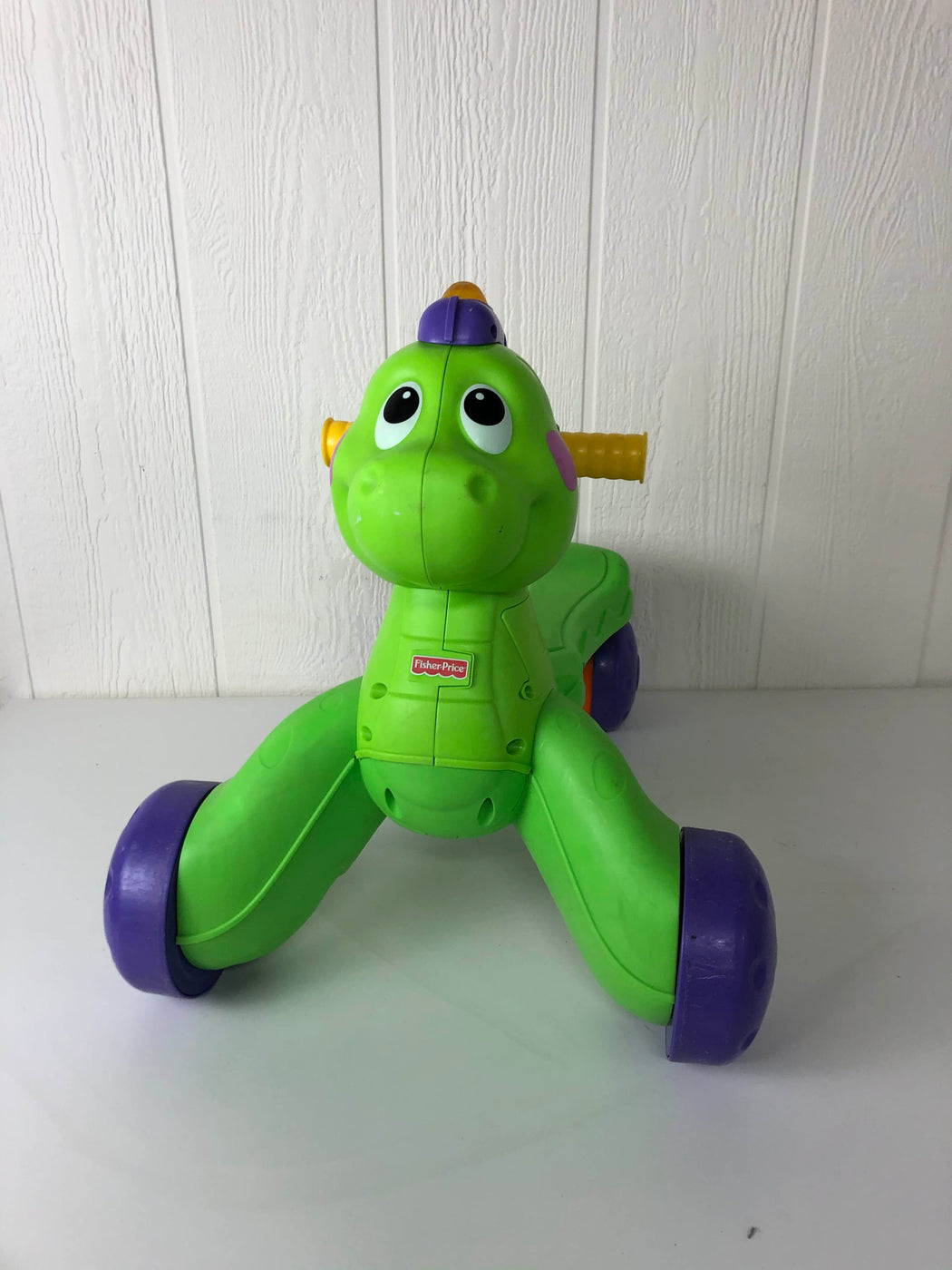 fisher price stride to ride dino