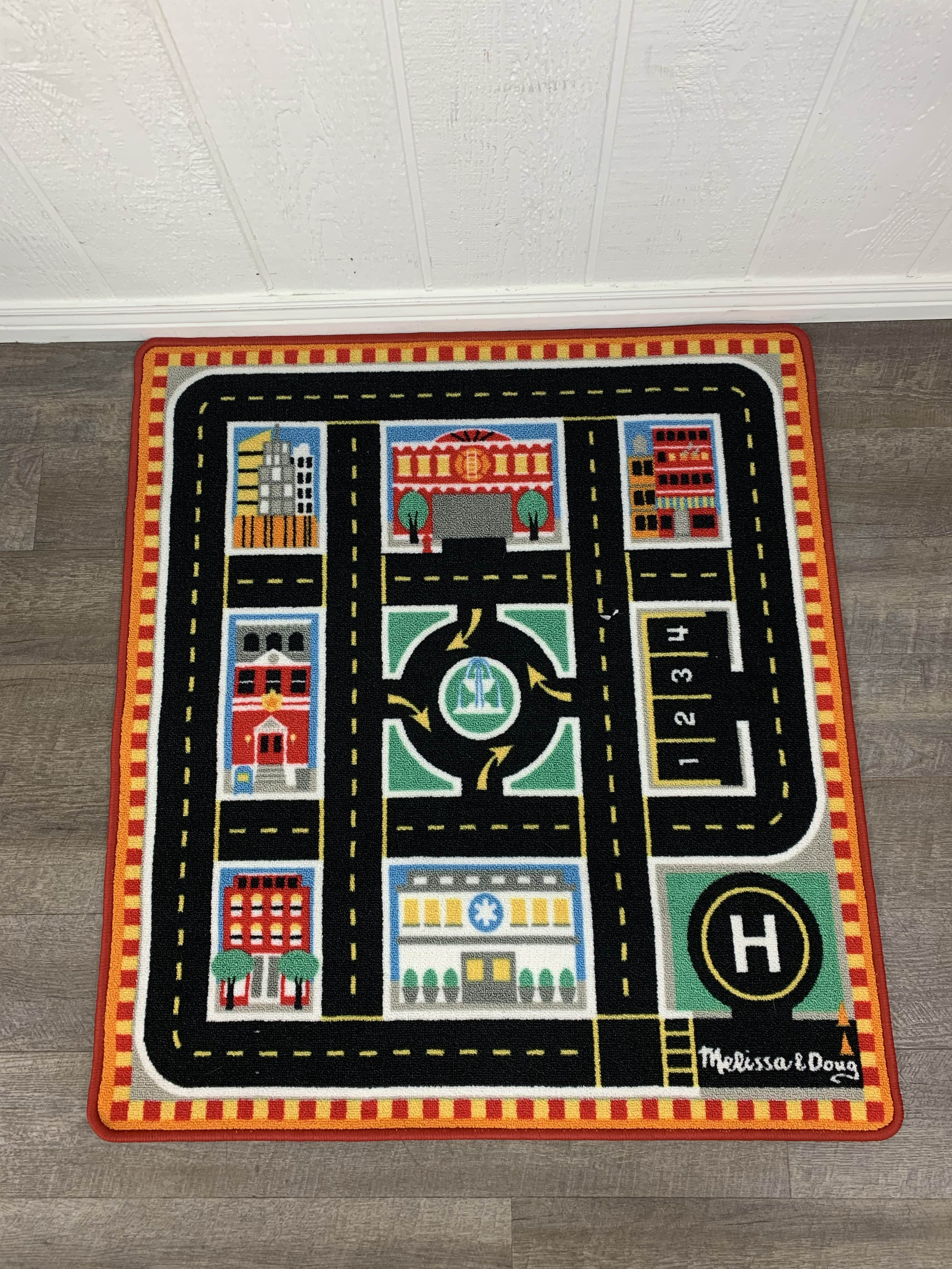 melissa and doug round the city rescue rug