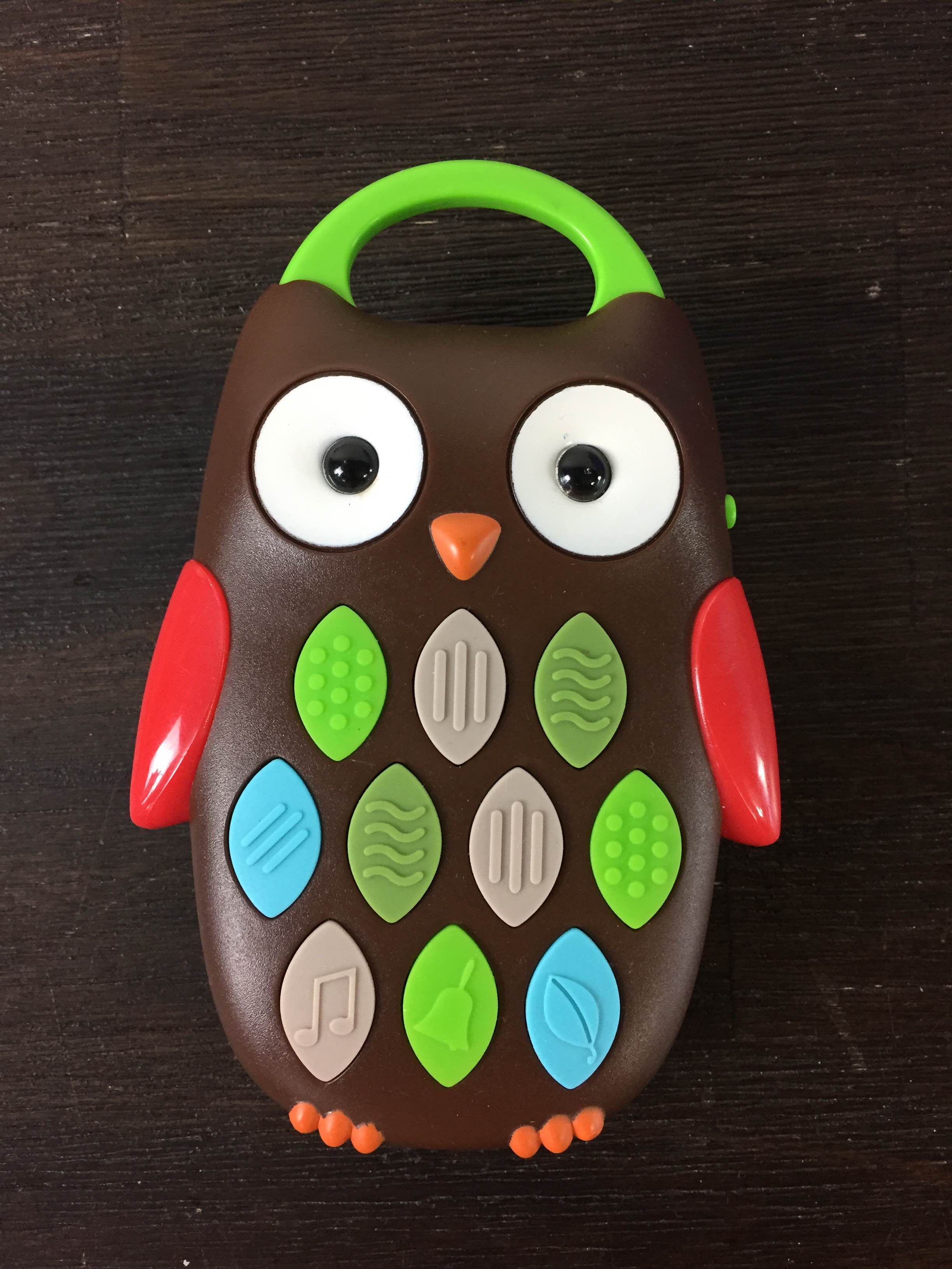 skip hop explore and more rolling owl push toy